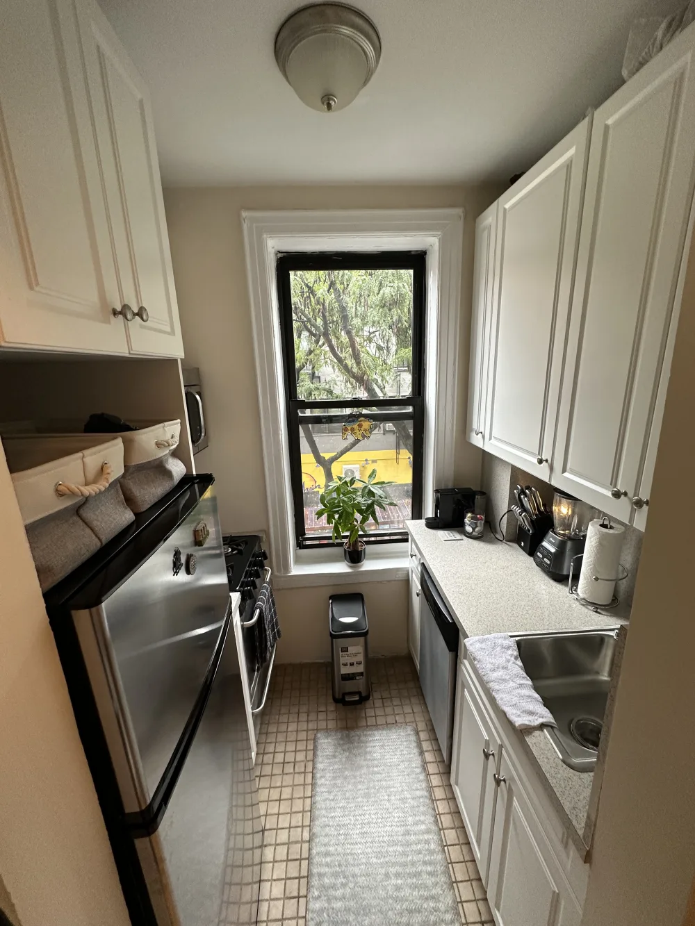 Cozy kitchen with modern appliances.