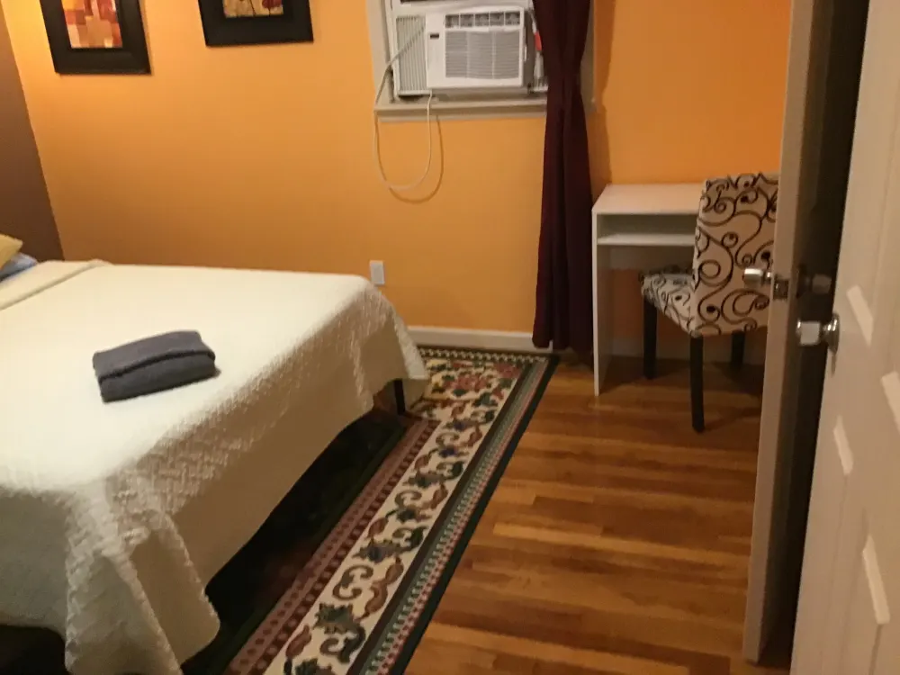 Cozy bedroom with desk space.