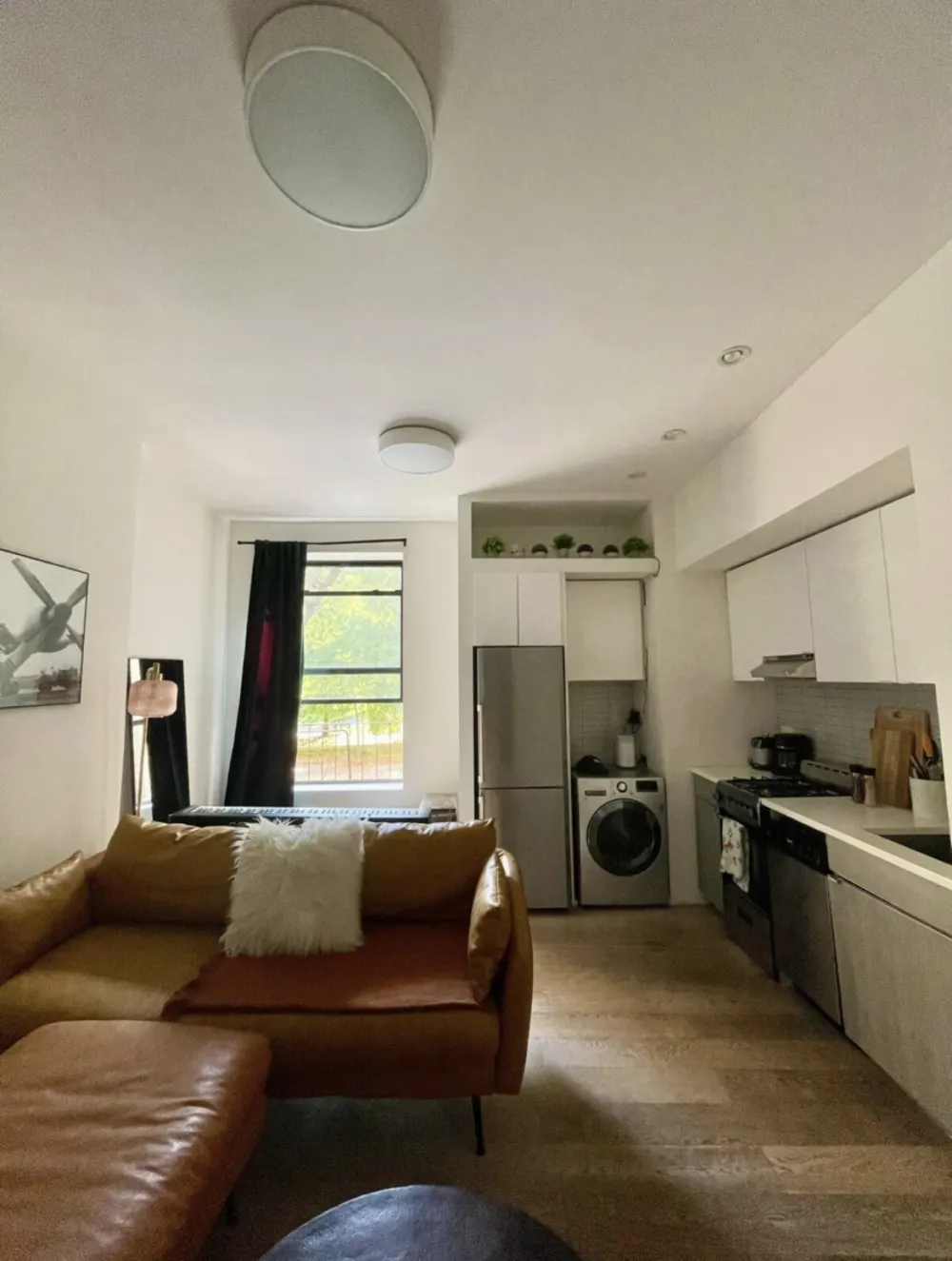 Modern apartment with kitchen area.