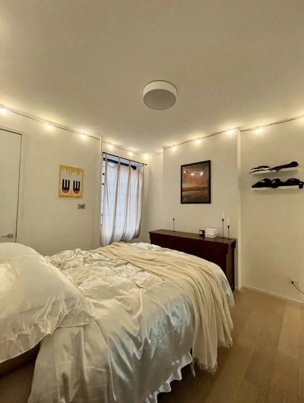 Cozy bedroom with soft lighting.