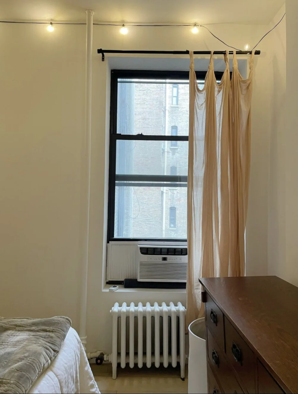 Cozy bedroom with natural light.