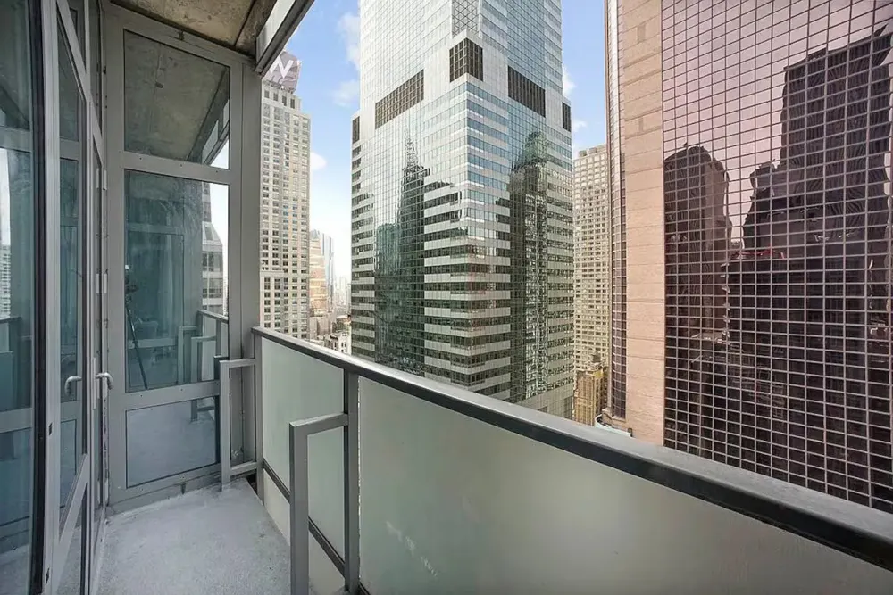 Balcony with view of skyscrapers.