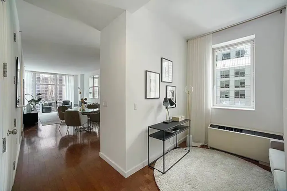 Modern apartment interior with desk.
