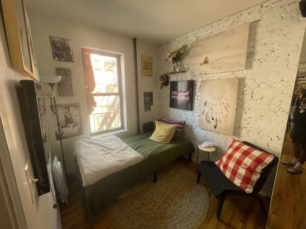 Cozy bedroom with eclectic decor.