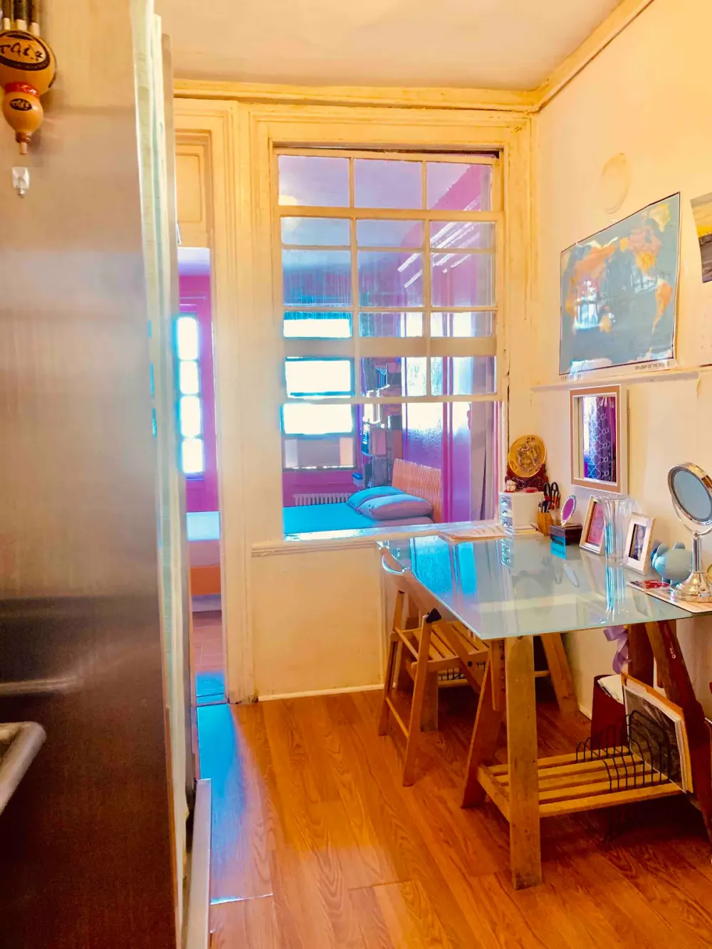 Cozy room with glass desk.