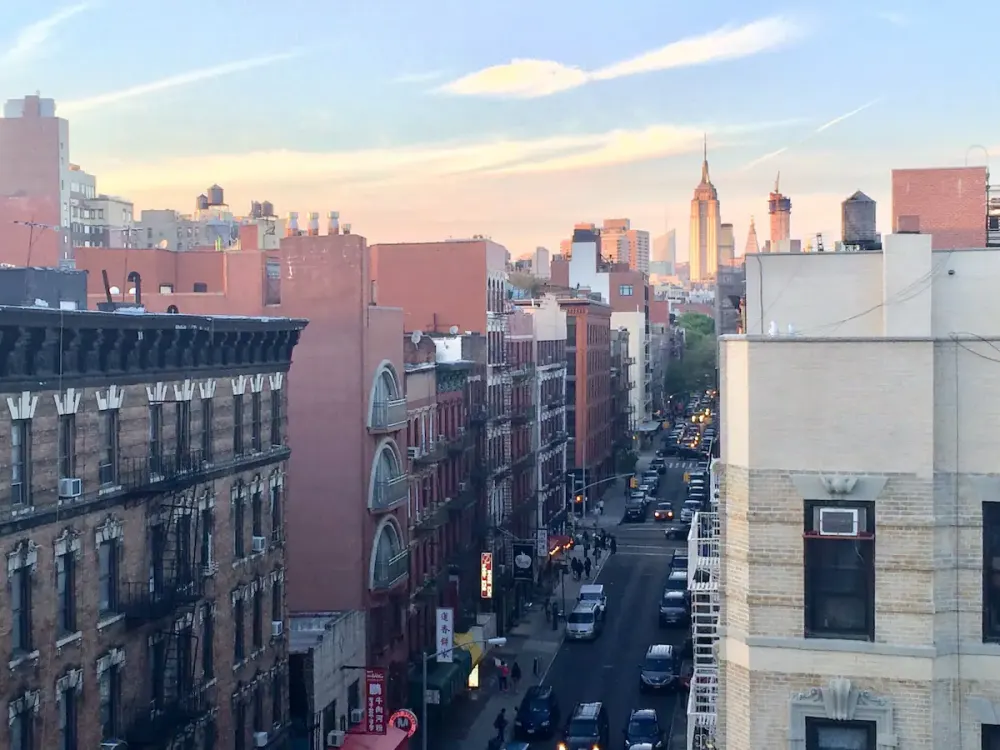 Urban street with sunset sky