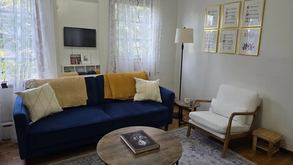 Cozy living room with couch.