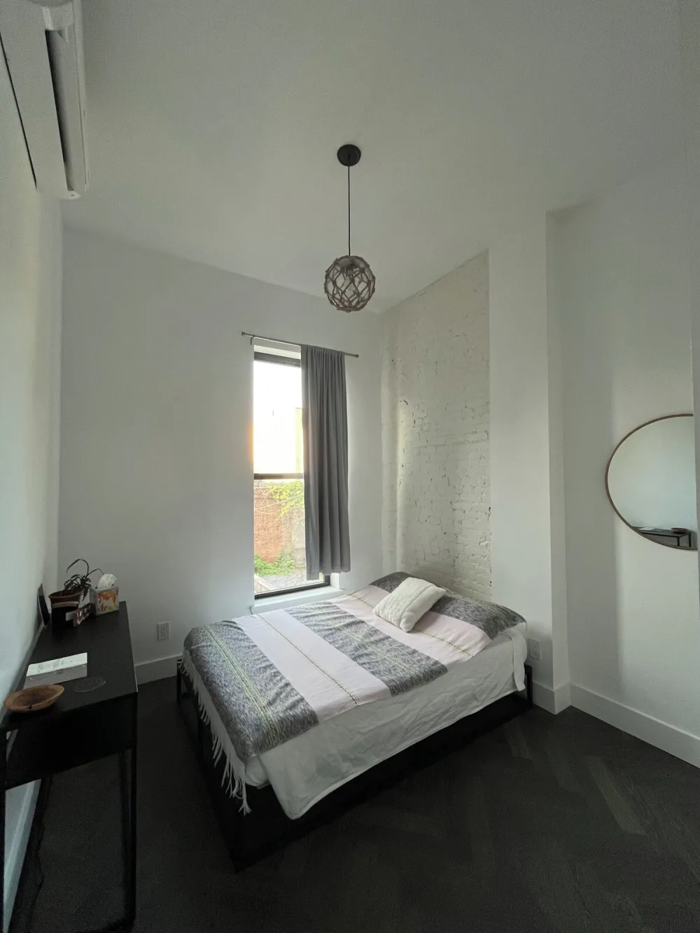 Cozy bedroom with minimalist decor.