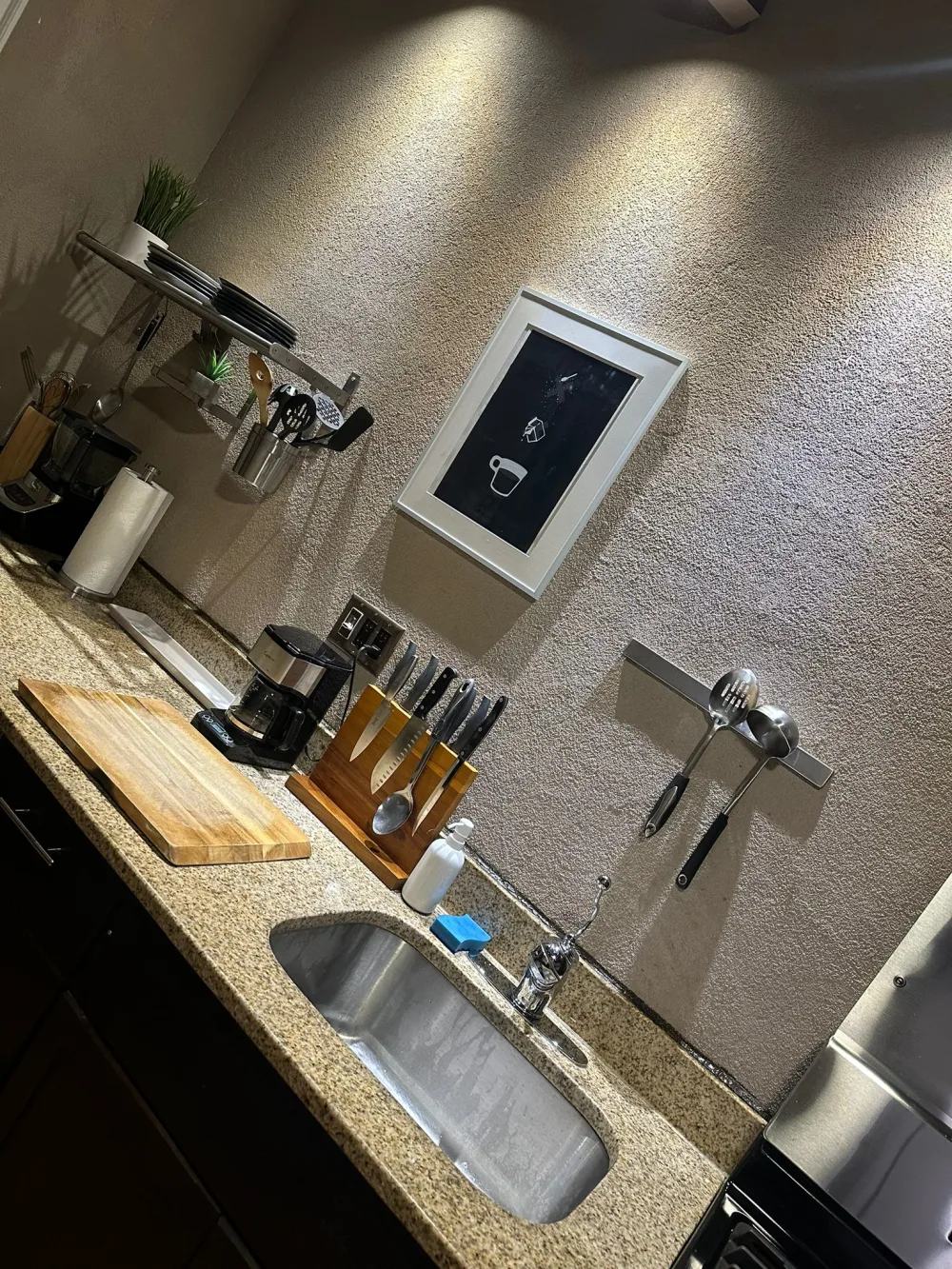 Modern kitchen with granite countertops.