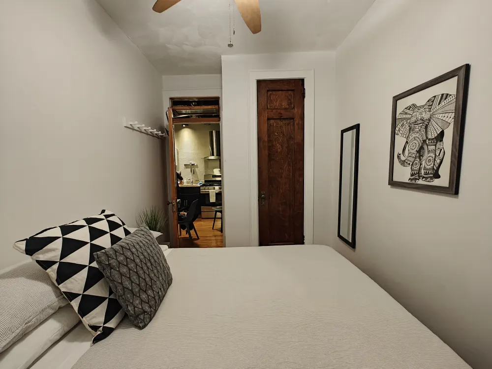 Cozy bedroom with modern decor.