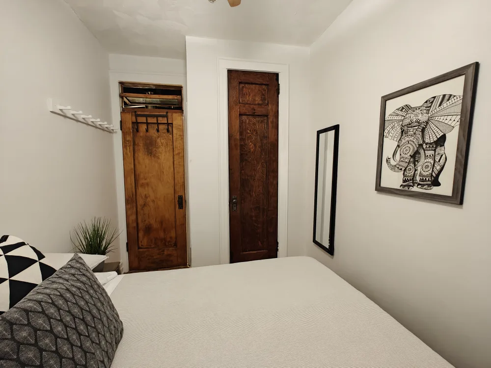 Cozy bedroom with minimalist decor.