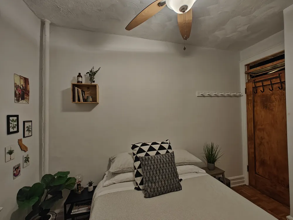 Cozy bedroom with minimalist decor.