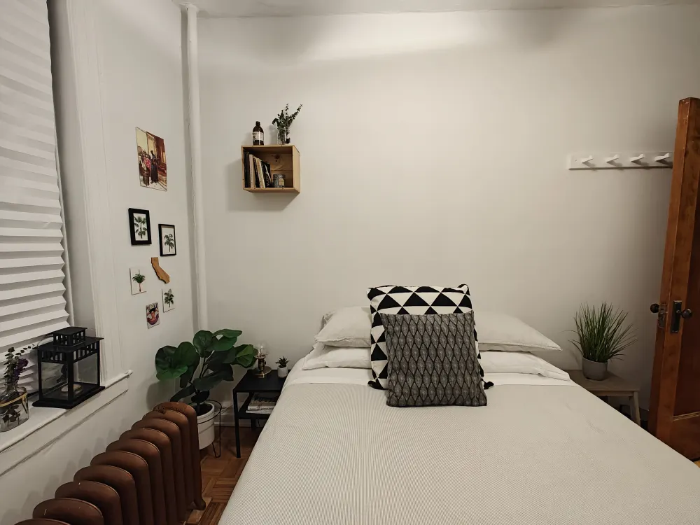 Cozy bedroom with minimalist decor.