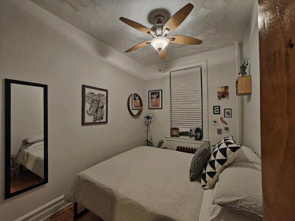 Cozy bedroom with artistic decor.