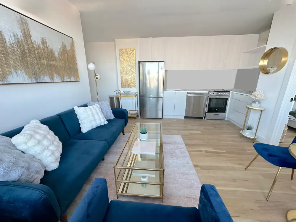 Modern living area with kitchenette.