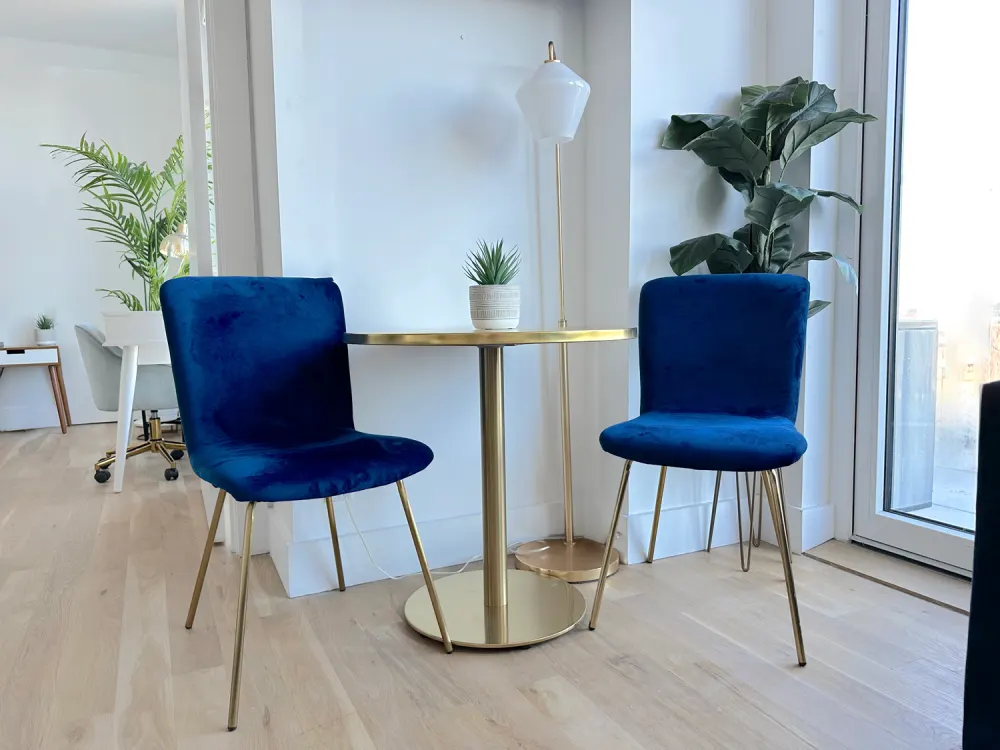 Modern seating with blue chairs.