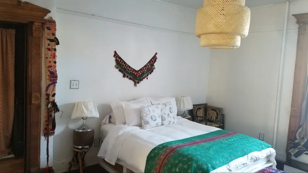 Cozy bedroom with ethnic decor.