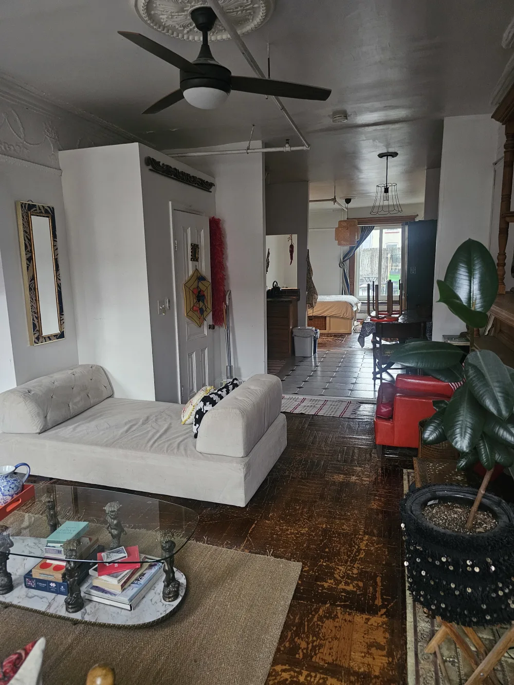 Eclectic living room with natural light.