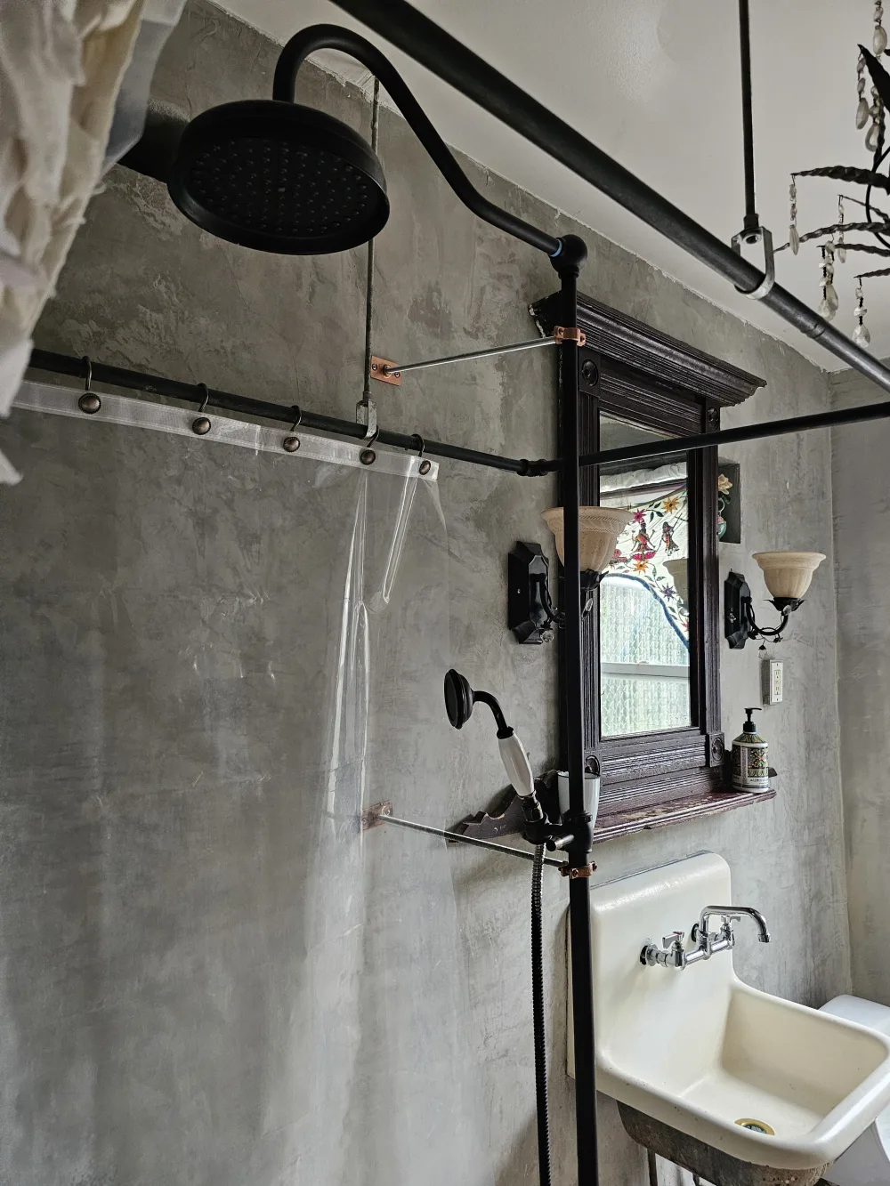 Industrial-style bathroom with vintage fixtures.