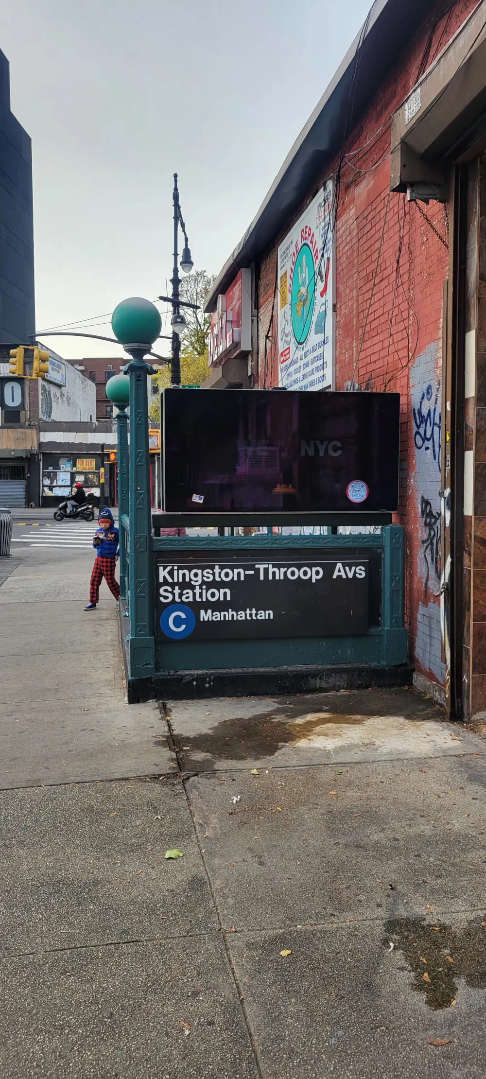 New York subway entrance, street scene.