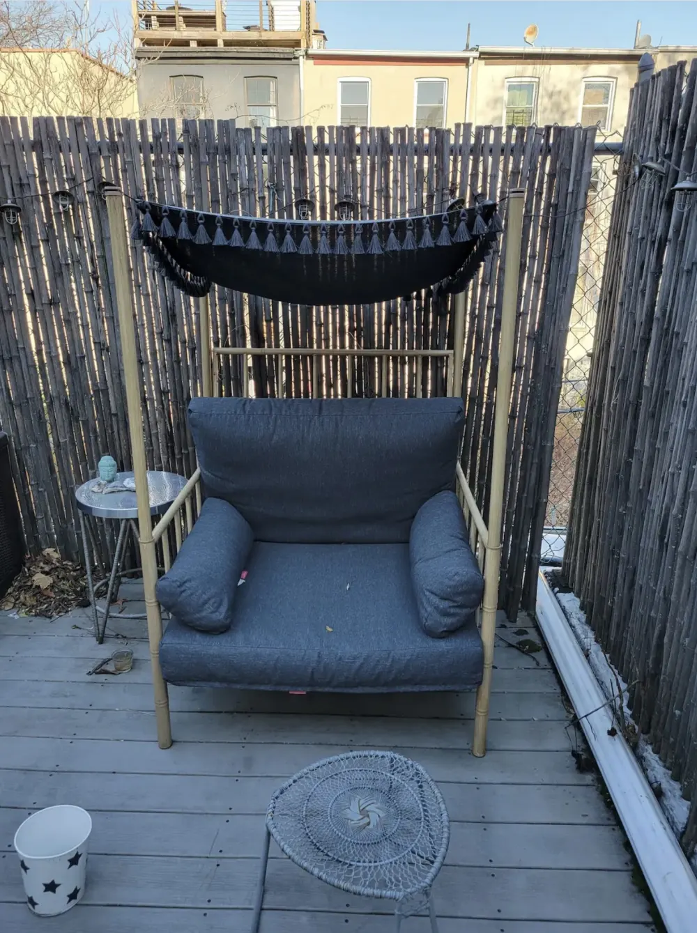 Cozy outdoor seating with hammock.