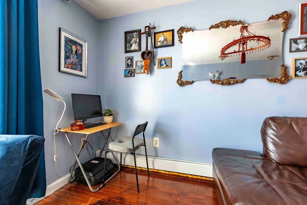 Cozy room with small desk.