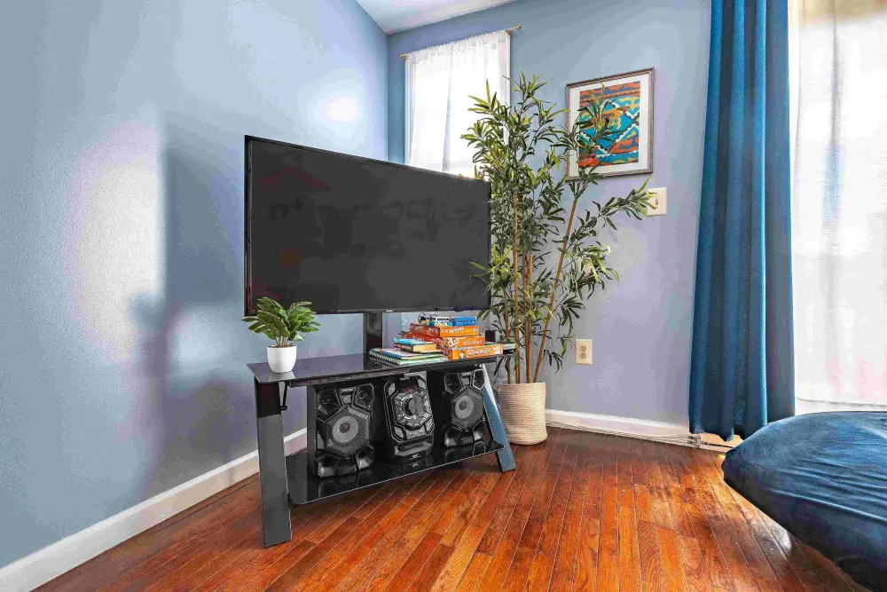 Cozy room with TV setup.