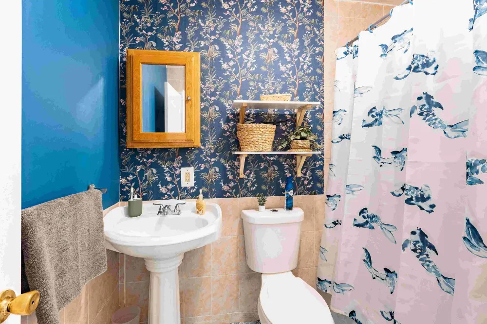 Colorful bathroom with floral wallpaper