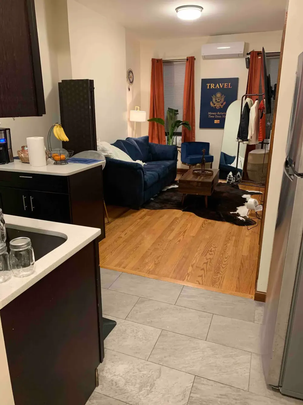 Cozy living room with kitchenette.