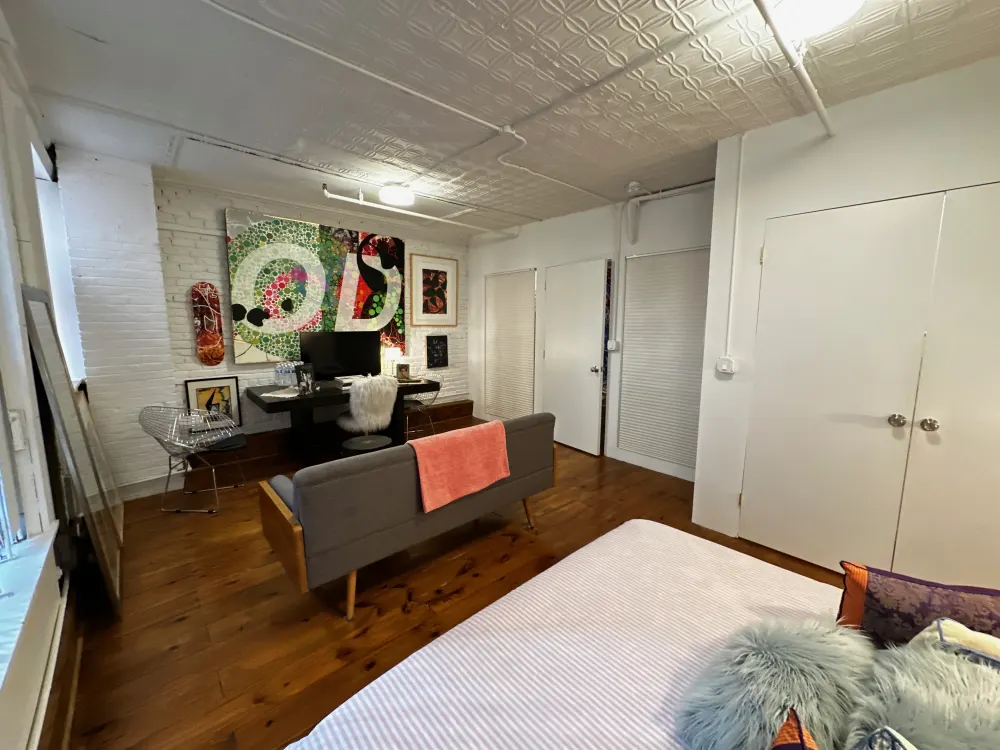 Bright room with eclectic decor.