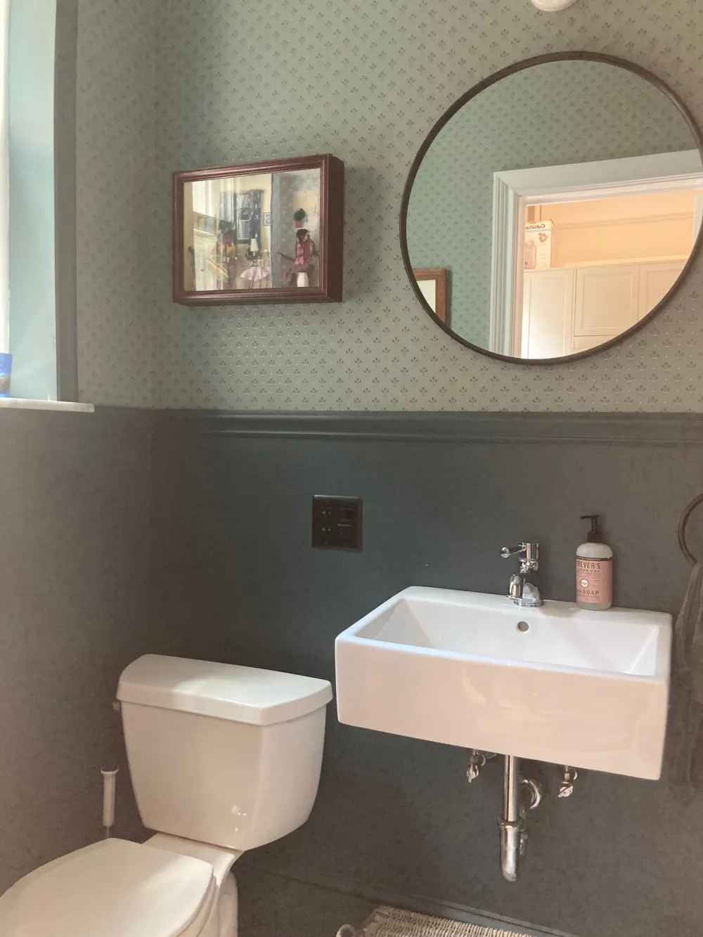 Compact bathroom with modern amenities.