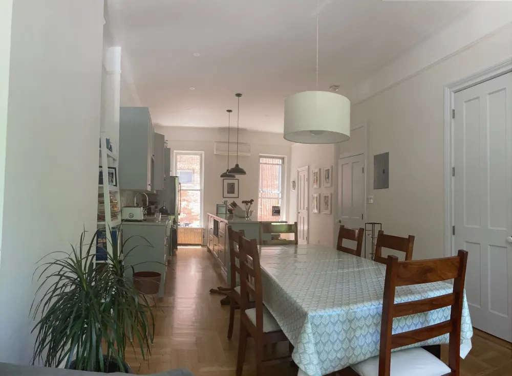 Bright, cozy dining and kitchen area.