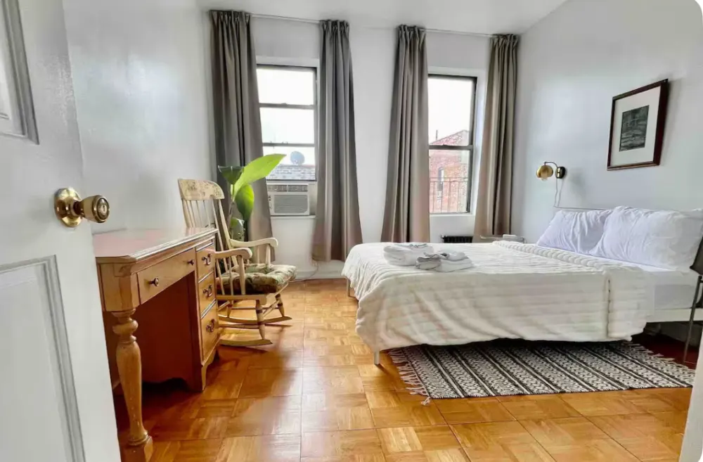 Cozy bedroom with natural light.