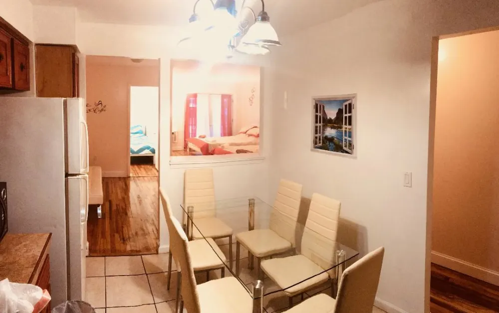 Cozy dining room with bedrooms.