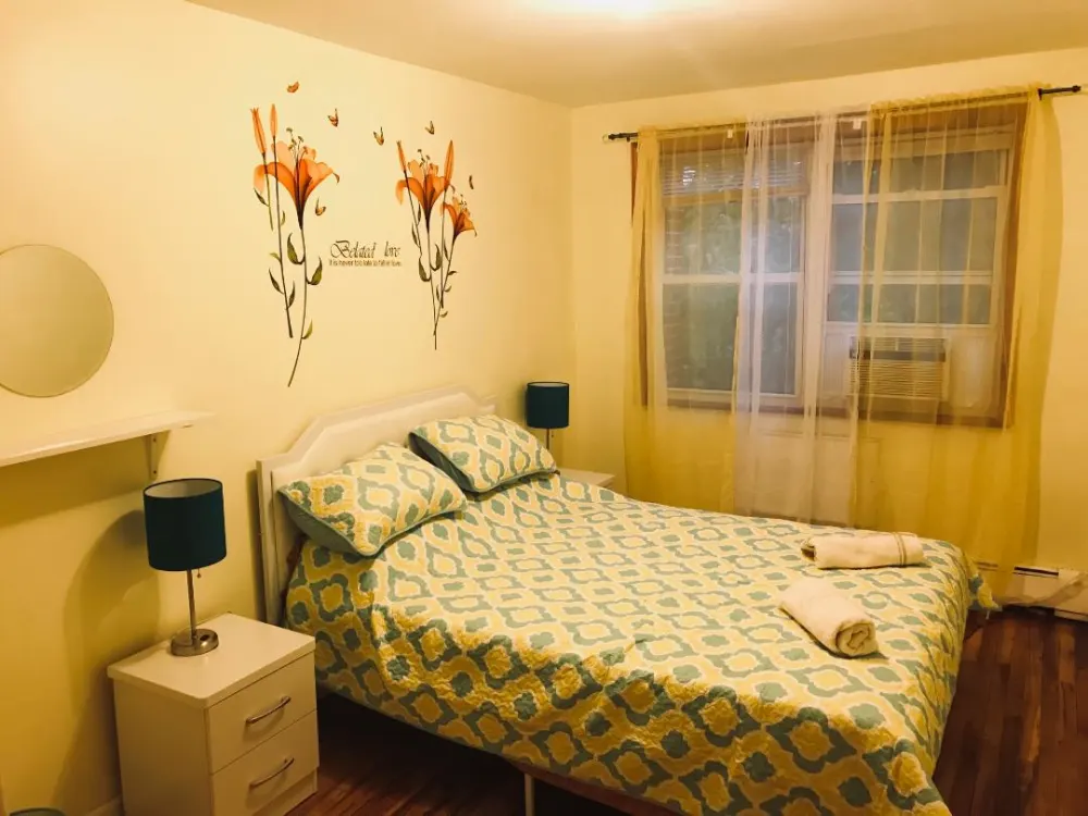 Cozy bedroom with floral decor.