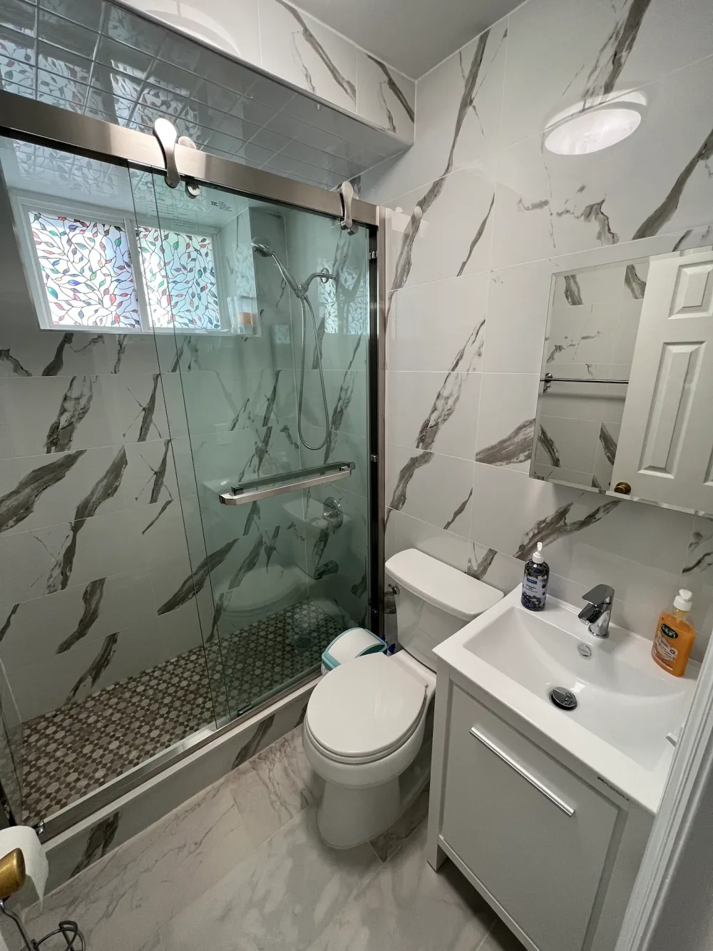 Modern bathroom with marble tiles.