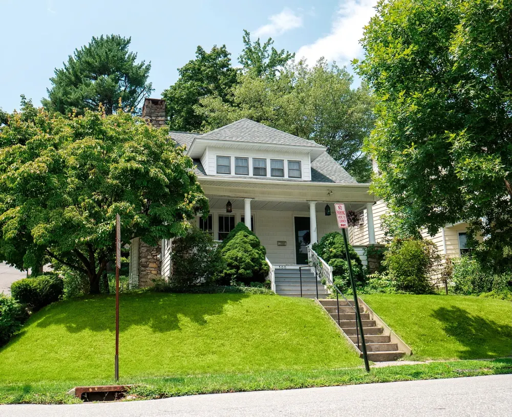 Charming house with lush lawn.