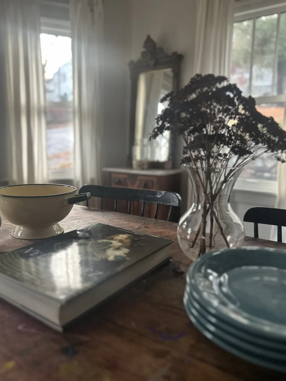 Cozy dining room with decor.