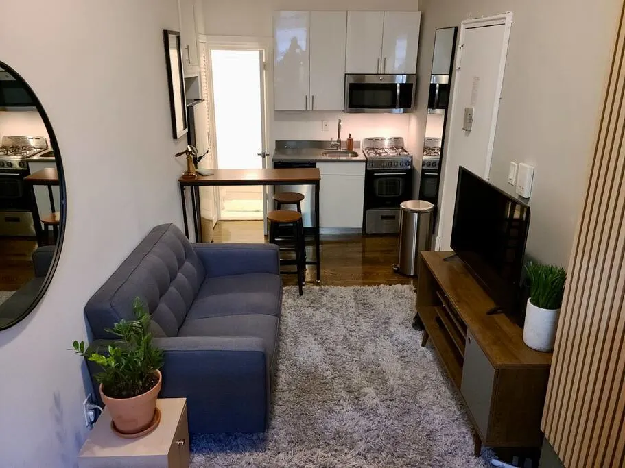 Cozy studio apartment with kitchenette.