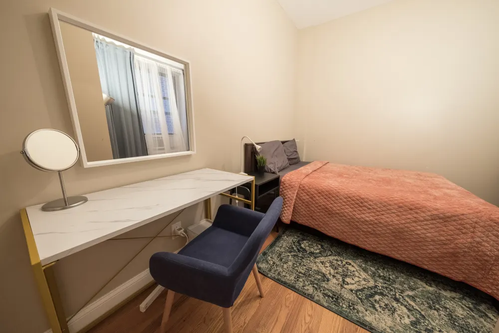 Cozy bedroom with modern furnishings.