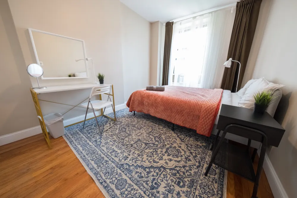 Cozy bedroom with modern furnishings.