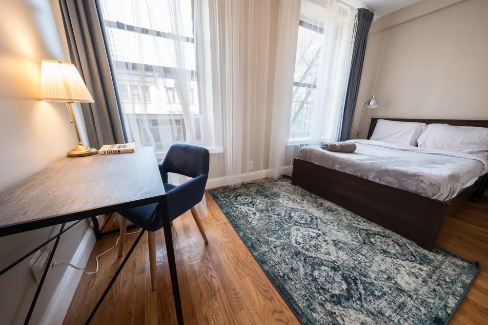 Cozy bedroom with modern furnishings.