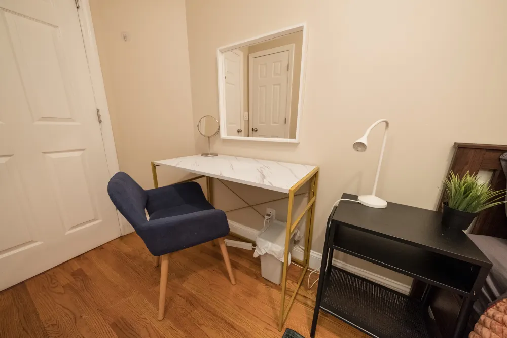 Modern desk setup with chair.