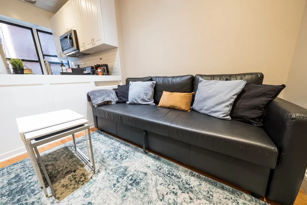 Cozy living area with couch.