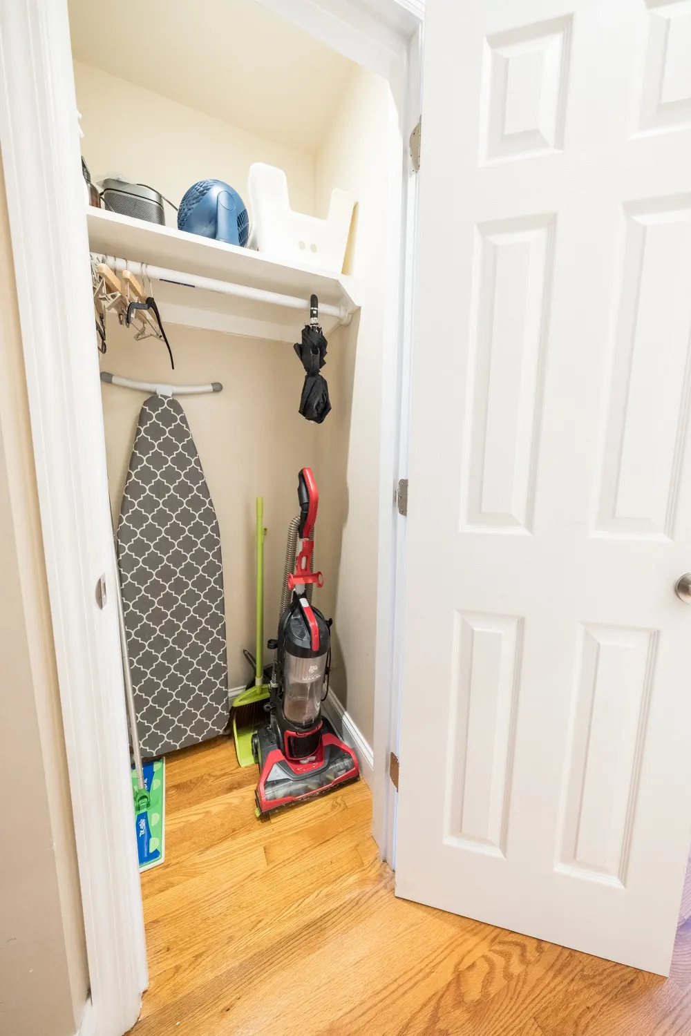 Closet with cleaning supplies and tools