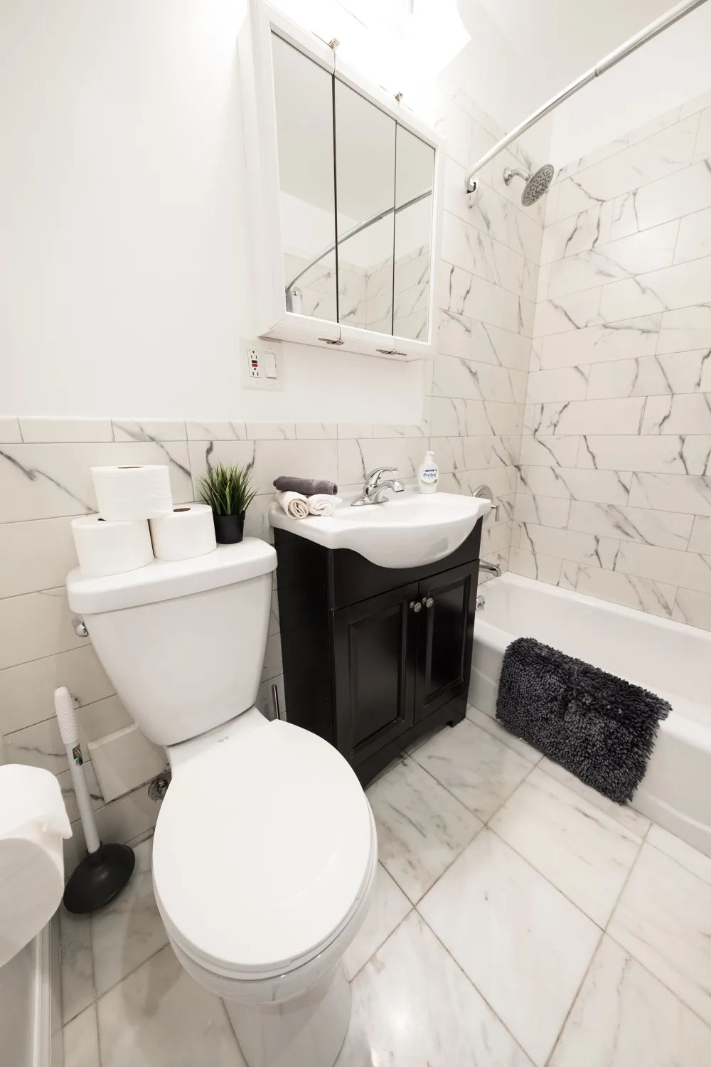 Modern bathroom with marble tiles.