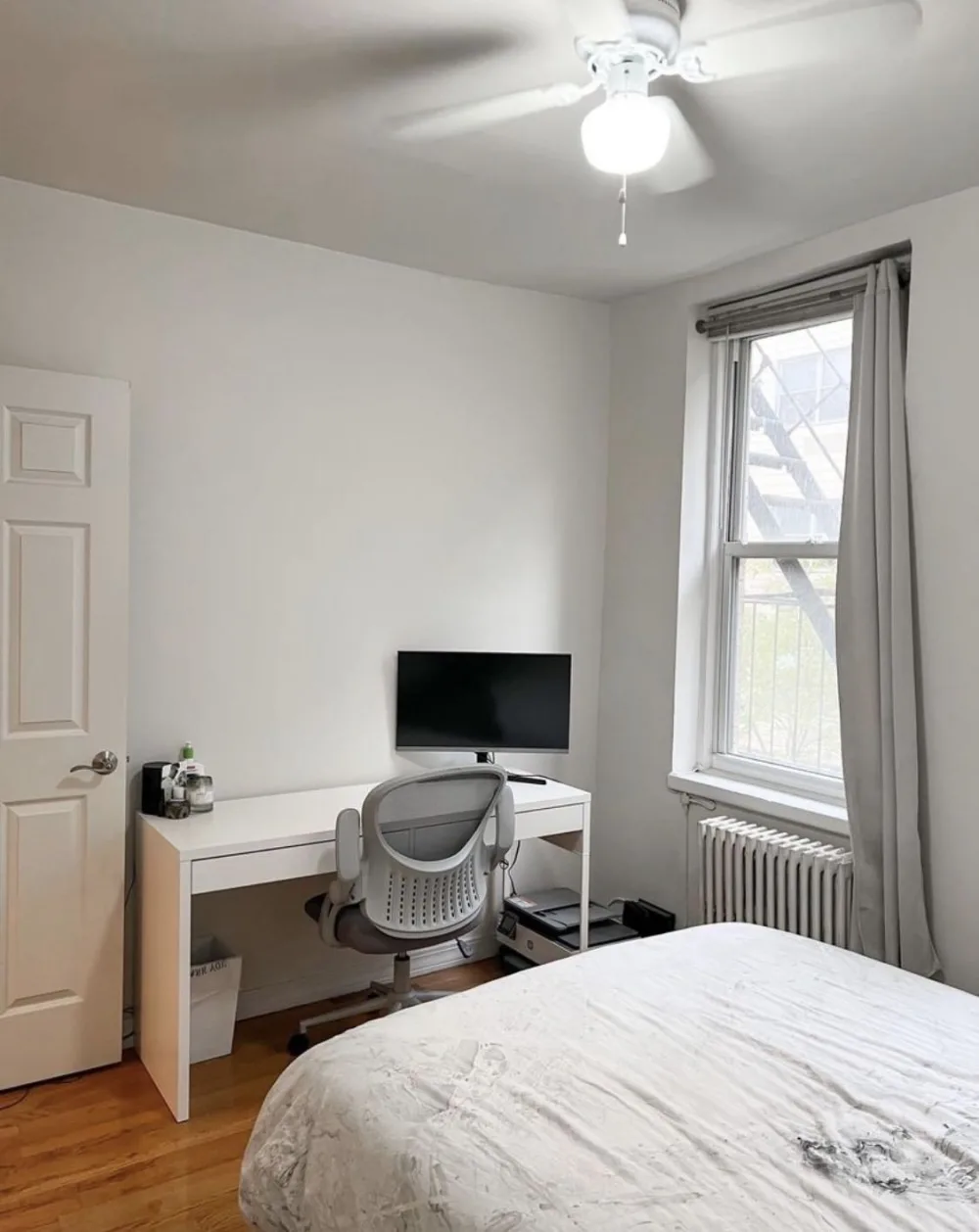 Simple bedroom with work desk