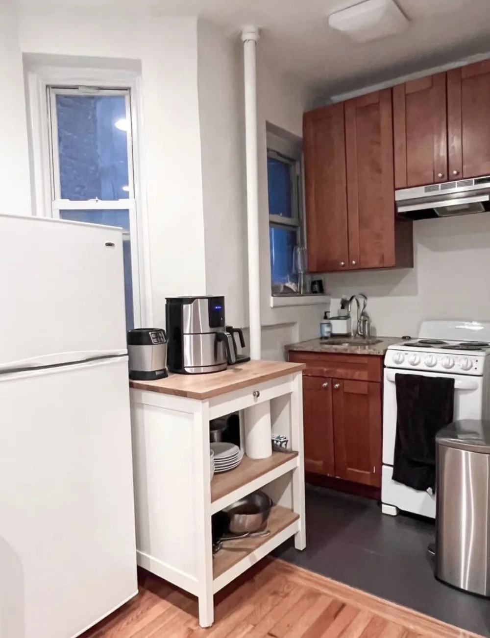 Cozy kitchen with modern appliances.