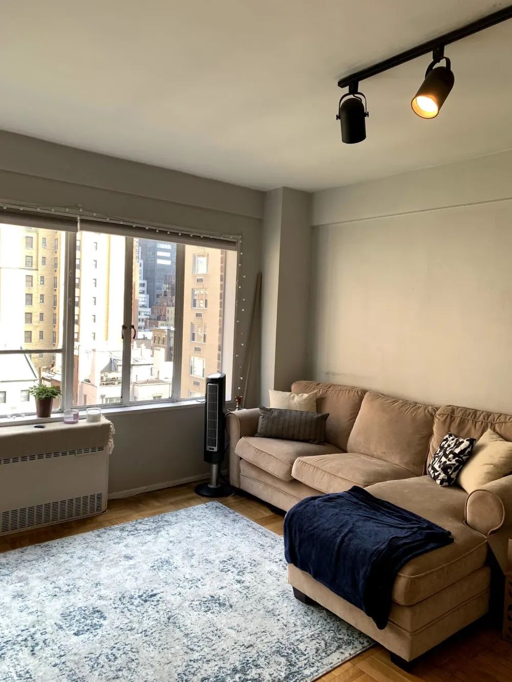 Cozy living room with city view.