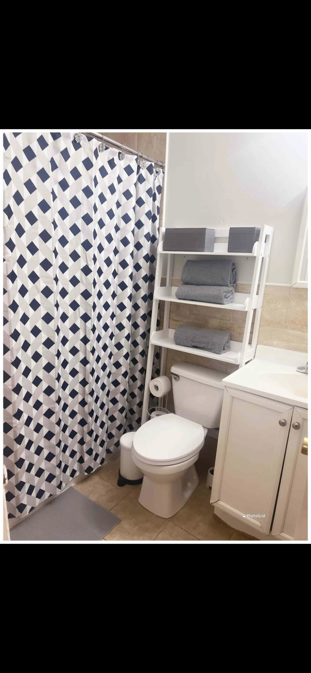 Modern bathroom with geometric decor.